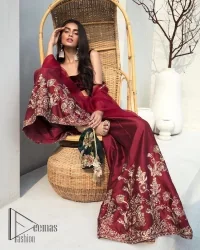 Walking into a new chapter of life with the joy of togetherness and the magic of love. A bright red long shirt is adorned with gorgeous motifs in gold. It is further encrusted with the real magic of tilla, dabka, and kora along with the sequins and pearls. The V shape neckline of this heavy long shirt adds more charm to the outfit when arrives with full sleeves. This beautiful reception piece is paired up with sharara in the same colour with attractive florals that are framed with pearls, Sitara and naqshi that draw the attention of the audience. Complete this article with a dupatta which is adorned with a heavy floral motif to balance the article.