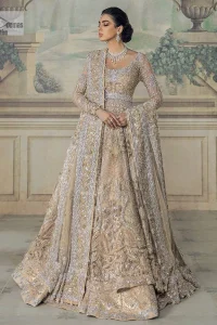 Beautiful fabrication and whimsical embroidery. What an absolute treat! The yellow maxi defines endless transitions of the intricate embellishment of silver embroidery, the patterns which portray a fusion of modern twists which enhances with tilla, dabka, zardozi, Resham and beautiful details of crystal. The round neckline of the maxi gives so soothing and romantic look when comes with full sleeves. The following maxi is beautifully systemized with can-can lehenga that is attractively adorned to make the outfit a unique masterpiece. Complete this article with the dupatta, framed with four-sided borders and sequins sprayed all over to meet the inner happiness of the bride.