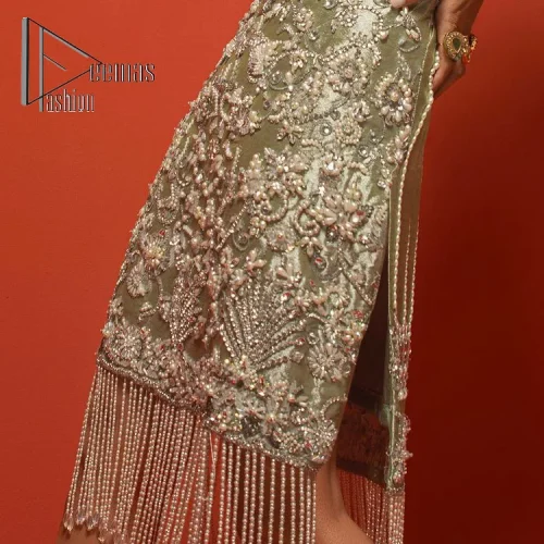 Celebrate your party events with DeemasFashion. An olive green shirt in tissue fabric, hand embellished with dabka, nakshi, cut dana,