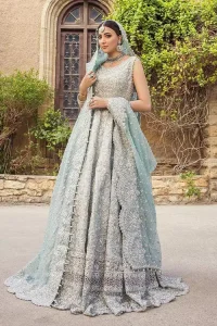 For the love of blue! A raw silk pale blue maxi with a heavy border is beautifully embroidered in silver colour. The maxi is enhanced with tilla, dabka, kora, Kundan, Sitara and detailing of resham. The round shape neckline is also beautifully decorated with silver embroidery to enhance the sleeveless style of the following maxi. It is paired up with a scalloped dupatta which is ornamented with four-sided borders and sequins sprayed all over in the same colour leaving you at the start of the Nikah event.