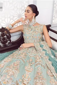 Be a fashion diva in this true modern classic Nikah outfit! The pale blue pleated maxi is handsomely adorned with multiple colour embroidery which is further enhanced with tilla, dabka, kora, Kundan and zardozi. The boat shape neckline makes a unique sense of the masterpiece when comes with sleeveless style. It is attractively organized with a dupatta in the same colour which is adorned with a four-sided border and enhanced with sequins sprayed all over to give you a modest look on your day.