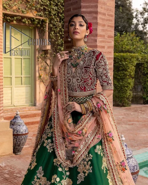 A combination of red and green are here to win hearts at your Mehndi. The attractive lehenga in green colour