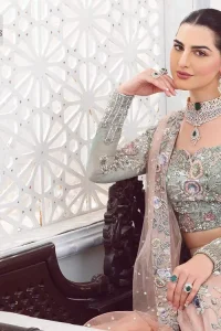 When you asked for it, we heard it. This sea green hued blouse has multiple colour embroidered details of tilla,dabka, kora, zari and sequin. It has a sweetheart neck and full sleeves style for gaining full attractiveness on your Nikah. The following blouse is organized with tea rose lehenga which is heavily embellished to make this masterpiece more aesthetic and cool.  Complete this article with a dupatta which is adorned with a four-sided embellished border. Further, it is enhanced with a sequin spray that you actually want for your big day.