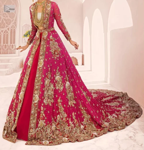 A maxi in a beautiful shade of shocking pink is deftly adorned with glowing tilla, dabka and pearls making this