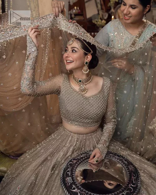 Regal and Charismatic - This is all the outfit is about! A desirable beige lehenga and choli are entirely heavily