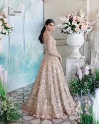 Make your Nikah look pop with the unique pieces from DeemasFashion. This pishwas is hand-embellished with multiple colour embroidery and lavish designs. Pearls, tilla, dabka, kora, zardozi and sequins give a glamorous touch to this Pishwas. The V neckline of the following pishwas archives a finished look. Further, the full sleeves balance the look of the outfit to make your day charming and beautiful. It is coordinated with floor length lehenga and is also embellished to make this stunning attire a breathtaking choice to wear on the most important day of your life. Finish this with a dupatta framed with four-sided borders and sequins sprayed all over.