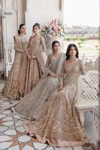 Make your Nikah look pop with the unique pieces from DeemasFashion. This pishwas is hand-embellished with multiple colour embroidery and lavish designs. Pearls, tilla, dabka, kora, zardozi and sequins give a glamorous touch to this Pishwas. The V neckline of the following pishwas archives a finished look. Further, the full sleeves balance the look of the outfit to make your day charming and beautiful. It is coordinated with floor length lehenga and is also embellished to make this stunning attire a breathtaking choice to wear on the most important day of your life. Finish this with a dupatta framed with four-sided borders and sequins sprayed all over.