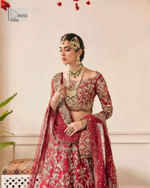 This outfit is a stand-out look for the Pakistani reception, this ensemble consists of a bright red-hued lehenga choli. This