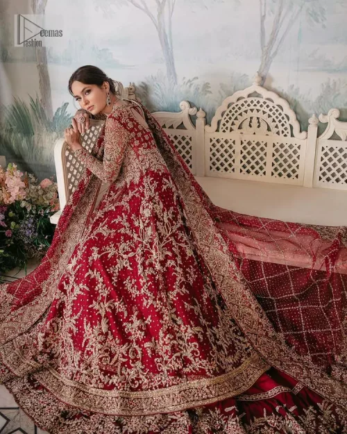 Bright and blissful! This ensemble is the epitome of grace. The maxi is fully emblazoned with tilla, dabka, kora, Kundan