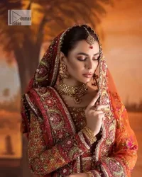 Blissful rust! This ensemble is the epitome of grace. DeemasFashion presents this beautiful mehndi outfit in rust colour to make your day super amazing. The flare maxi is attractively adorned with thread, kora, Kundan and the real magic of Zardozi. It is decorated with multiple colour embroidery to give you glam and gorgeous look. The round neckline and full sleeves are a finished way to make this masterpiece more attractive and charming. The following maxi is paired up with a dupatta in the same colour framed with a four-sided border to make the outfit graceful.