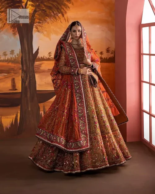 Blissful rust! This ensemble is the epitome of grace. DeemasFashion presents this beautiful mehndi outfit in rust colour to make