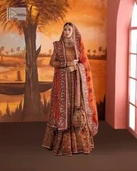 Blissful rust! This ensemble is the epitome of grace. DeemasFashion presents this beautiful mehndi outfit in rust colour to make your day super amazing. The flare maxi is attractively adorned with thread, kora, Kundan and the real magic of Zardozi. It is decorated with multiple colour embroidery to give you glam and gorgeous look. The round neckline and full sleeves are a finished way to make this masterpiece more attractive and charming. The following maxi is paired up with a dupatta in the same colour framed with a four-sided border to make the outfit graceful.