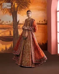 Blissful rust! This ensemble is the epitome of grace. DeemasFashion presents this beautiful mehndi outfit in rust colour to make your day super amazing. The flare maxi is attractively adorned with thread, kora, Kundan and the real magic of Zardozi. It is decorated with multiple colour embroidery to give you glam and gorgeous look. The round neckline and full sleeves are a finished way to make this masterpiece more attractive and charming. The following maxi is paired up with a dupatta in the same colour framed with a four-sided border to make the outfit graceful.