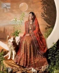 Blissful rust! This ensemble is the epitome of grace. DeemasFashion presents this beautiful mehndi outfit in rust colour to make your day super amazing. The flare maxi is attractively adorned with thread, kora, Kundan and the real magic of Zardozi. It is decorated with multiple colour embroidery to give you glam and gorgeous look. The round neckline and full sleeves are a finished way to make this masterpiece more attractive and charming. The following maxi is paired up with a dupatta in the same colour framed with a four-sided border to make the outfit graceful.