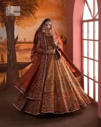 Blissful rust! This ensemble is the epitome of grace. DeemasFashion presents this beautiful mehndi outfit in rust colour to make your day super amazing. The flare maxi is attractively adorned with thread, kora, Kundan and the real magic of Zardozi. It is decorated with multiple colour embroidery to give you glam and gorgeous look. The round neckline and full sleeves are a finished way to make this masterpiece more attractive and charming. The following maxi is paired up with a dupatta in the same colour framed with a four-sided border to make the outfit graceful.