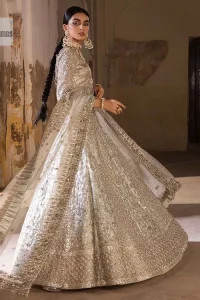 The fusion of this silver canvas decorated with vibrant contrasts is all you need to stun on your day! DeemasFashion presents this nikah wear in silver colour which is highlighted with tilla, dabka, kora, Kundan and the real magic of Zardozi. The round neckline of the following blouse has an ethnic charm. It is embellished with silver embroidery to make this masterpiece a dreamy one. The full sleeves style of the blouse also adds beauty to the outfit. It is paired up with a lehenga which is heavily embellished. The stunning dress in the Lehenga Choli style achieves the final charming look when paired with a dupatta in the same colour framed with four-sided borders and sequins sprayed all over. 