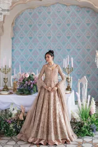 Make your Qabool Hai moment more memorable with this outfit by DeemasFashion. A dreamy statement of this dress proffers a soft pink hue with glamorous silver and golden embroidery.  It is further enhanced with tilla, dabka, kora, Kundan and the real magic of zardozi. V neckline enhances the overall glamour of this masterpiece. Intricate designs and fine details on the sleeves give a perfect finishing look to this maxi. The maxi is layered over a meticulously handcrafted lehnga which is bold enough to stand out in the crowd. Finish this article with a dupatta which is ornamented with four-sided borders and sequins sprayed all over which is a unique piece for your Nikah look. 