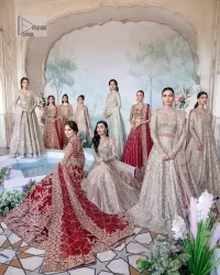 This intricate floral pattern is mirrored on a dreamy canvas to elevate your looks! The blouse in a bright red shade is a traditional attire to pair with a lehenga. The blouse is fully emblazoned with tilla, dabka, kora Kundan and crystals. Intricate designs and fine details of light golden embroidery give a perfect finishing look to the blouse. The boat shape neckline gives a stunning touch to the blouse. Further, Hand-crafted embellishments on full sleeves also add beauty to the outfit. It is systemized with can-can lehenga which is fully adorned with embroidery to fulfil the dreamy look. Finish this reception wear with a dupatta framed with four-sided embellished borders and sequins sprayed all over.