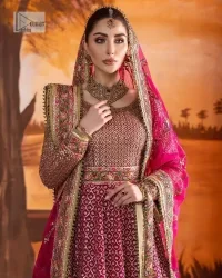 Experience the true essence of reception wear in alluring attires from DeemasFashion. The host pink pishwas is decorated with multiple colour embroidery which is handsomely enhanced with tilla, dabka, kora, Kundan and the real magic of Zardozi to make this masterpiece unique and charming. The finishing of boat shape neckline enhances the beauty of the attire. Furthermore, the full sleeves of the pishwas are a perfectly charming choice to pair with a Pishwas. It is coordinated with a jamawar lehenga whose border is adorned with beautiful embroidery. Complete this article with a dupatta framed with four-sided embellished borders and sequins sprayed all over.
