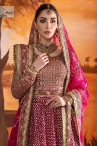 Experience the true essence of reception wear in alluring attires from DeemasFashion. The host pink pishwas is decorated with multiple colour embroidery which is handsomely enhanced with tilla, dabka, kora, Kundan and the real magic of Zardozi to make this masterpiece unique and charming. The finishing of boat shape neckline enhances the beauty of the attire. Furthermore, the full sleeves of the pishwas are a perfectly charming choice to pair with a Pishwas. It is coordinated with a jamawar lehenga whose border is adorned with beautiful embroidery. Complete this article with a dupatta framed with four-sided embellished borders and sequins sprayed all over.