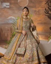 Enhance your beauty by dressing in magic. The most beautiful day of your life deserves an overall dome of embodiment, which is why you need an aqua-blue Anarkali to make you look stunning as a bride. The aqua blue, Anarkali and lehenga are hand-rendered in multiple colour embroidery and are further enhanced with pearls, nakshi, Sitara, tilla, kora, Zardozi and dabka.  The round neckline of the following Anarkali defines the beauty and charm of this unique article. Furthermore, the full sleeves are adorned with floral patterns. It is paired up with lehenga which is ornamented with a heavily embellished border to make this masterpiece unique. Complete this nikah wear with a dupatta adorned with four-sided embellished borders and tiny motifs sprinkled all over.