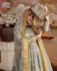 Enhance your beauty by dressing in magic. The most beautiful day of your life deserves an overall dome of embodiment, which is why you need an aqua-blue Anarkali to make you look stunning as a bride. The aqua blue, Anarkali and lehenga are hand-rendered in multiple colour embroidery and are further enhanced with pearls, nakshi, Sitara, tilla, kora, Zardozi and dabka.  The round neckline of the following Anarkali defines the beauty and charm of this unique article. Furthermore, the full sleeves are adorned with floral patterns. It is paired up with lehenga which is ornamented with a heavily embellished border to make this masterpiece unique. Complete this nikah wear with a dupatta adorned with four-sided embellished borders and tiny motifs sprinkled all over.