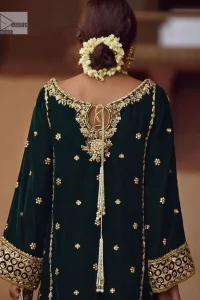 This outfit glam up in our detailed embroidered fabrics made to make you shine for every occasion. The black long shirt in premium quality velvet is beautifully decorated with multiple colour embroidery which is further enhanced with tilla, dabka, kora, Kundan and the real magic of Zardozi. The following shirt has an embellished neckline to meet the trending grace. Further, the half sleeves are adorned with floral motifs. It is coordinated with sharara in the same colour to balance the overall royal look of this party wear. Complete this article with a dupatta in the double shade that is a beautiful piece for a bridesmaid who has a unique taste.