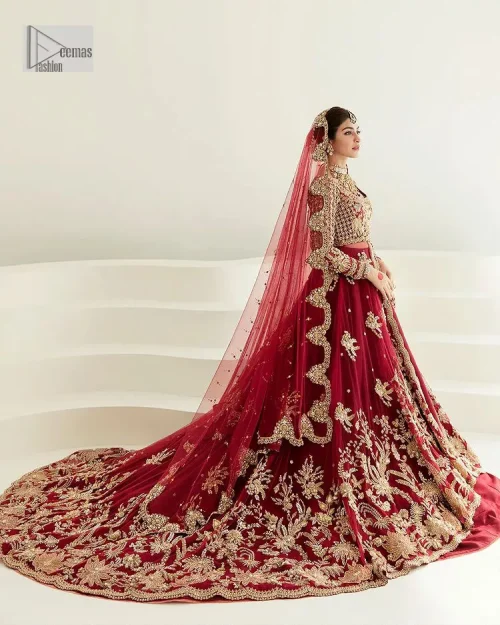 Be a dreamy vision in this reception wear. The beautiful pishwas in the bright red shade is embellished with intricate