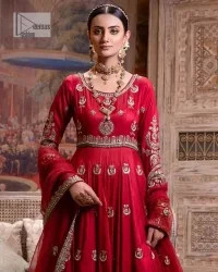 The traditional style is the new thing in the market. The stunning pishwas in the deep red shade is an eye-catching attire that gives you your desired dreamy appearance on your Big day. Beautiful work of zardozi, tilla, dabka, kora, Kundan, pearls, and beads make this attire an epitome of glamour and royalty. Embellished borders, as well as the bodice, gives an enchanting touch to this pishwas. Further, the round neckline of the outfit gives a royal touch. Further, fancy floral motifs are also adorned on the sleeves of this reception wear. It is organized with a dupatta framed with a four-sided border and sparkling tiny floral motifs all over.