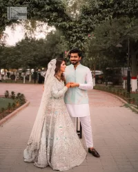 Brighten up your big day with this beautiful ensemble - Perfectly suited to the trend! DeemasFashion presents this nikah wear in the shade of ice blue. This stunning maxi has a fully embellished square neckline and full sleeves. Graceful multiple-colour work and floral designs enhance the charm of this maxi. Zardozi, pearls, dabka, kora, Kundan, and stones give a perfect finish to the overall look. The flares of the following maxi make it your foremost priority to wear on the most important day of your life. Paired this with a dupatta which is adorned with a four sided embellished borders and sequins sprayed all over to make this look more charming and perfect.