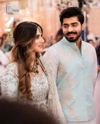 Brighten up your big day with this beautiful ensemble - Perfectly suited to the trend! DeemasFashion presents this nikah wear in the shade of ice blue. This stunning maxi has a fully embellished square neckline and full sleeves. Graceful multiple-colour work and floral designs enhance the charm of this maxi. Zardozi, pearls, dabka, kora, Kundan, and stones give a perfect finish to the overall look. The flares of the following maxi make it your foremost priority to wear on the most important day of your life. Paired this with a dupatta which is adorned with a four sided embellished borders and sequins sprayed all over to make this look more charming and perfect.