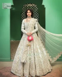 Brighten up your big day with this beautiful ensemble - Perfectly suited to the trend! DeemasFashion presents this nikah wear in the shade of ice blue. This stunning maxi has a fully embellished square neckline and full sleeves. Graceful multiple-colour work and floral designs enhance the charm of this maxi. Zardozi, pearls, dabka, kora, Kundan, and stones give a perfect finish to the overall look. The flares of the following maxi make it your foremost priority to wear on the most important day of your life. Paired this with a dupatta which is adorned with a four sided embellished borders and sequins sprayed all over to make this look more charming and perfect.