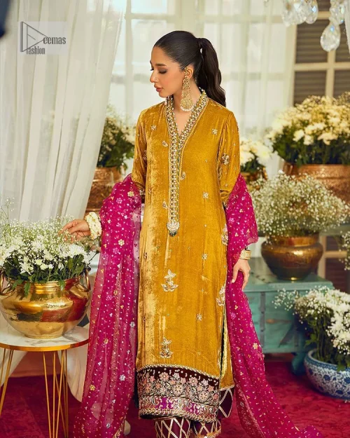 This mustard ensemble features zari and tilla details creating the perfect magical look for the season! The stunning long shirt