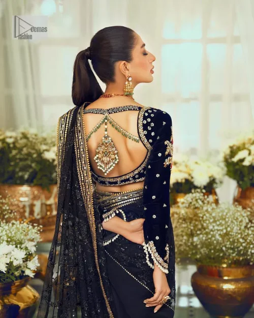 Black, is a reminder to love yourself. The navy blue blouse is augmented with elusive dabka and remarkable naqshi to