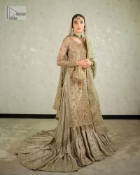 Comfy is a mood. The latest style of shirt sharara in high-quality fabric detailing with light gold gota, zari, dabka, sequence, naqshi, stones & tilla work all over the outfit. Full embellished shirt with full detailing and heavy neckline design with high-quality inner. Further, the beautiful floral motifs are adorned on sleeves to make this masterpiece super aesthetic It is coordinated with sharara with heavy embroidery on the border. The floor-length sharara gives a unique look. Complete this walima wear with a dupatta adorned with four-sided embellished frames and sequins sprayed all over.