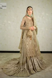 Comfy is a mood. The latest style of shirt sharara in high-quality fabric detailing with light gold gota, zari, dabka, sequence, naqshi, stones & tilla work all over the outfit. Full embellished shirt with full detailing and heavy neckline design with high-quality inner. Further, the beautiful floral motifs are adorned on sleeves to make this masterpiece super aesthetic It is coordinated with sharara with heavy embroidery on the border. The floor-length sharara gives a unique look. Complete this walima wear with a dupatta adorned with four-sided embellished frames and sequins sprayed all over.