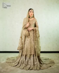 Comfy is a mood. The latest style of shirt sharara in high-quality fabric detailing with light gold gota, zari, dabka, sequence, naqshi, stones & tilla work all over the outfit. Full embellished shirt with full detailing and heavy neckline design with high-quality inner. Further, the beautiful floral motifs are adorned on sleeves to make this masterpiece super aesthetic It is coordinated with sharara with heavy embroidery on the border. The floor-length sharara gives a unique look. Complete this walima wear with a dupatta adorned with four-sided embellished frames and sequins sprayed all over.