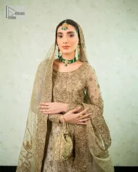 Comfy is a mood. The latest style of shirt sharara in high-quality fabric detailing with light gold gota, zari, dabka, sequence, naqshi, stones & tilla work all over the outfit. Full embellished shirt with full detailing and heavy neckline design with high-quality inner. Further, the beautiful floral motifs are adorned on sleeves to make this masterpiece super aesthetic It is coordinated with sharara with heavy embroidery on the border. The floor-length sharara gives a unique look. Complete this walima wear with a dupatta adorned with four-sided embellished frames and sequins sprayed all over.