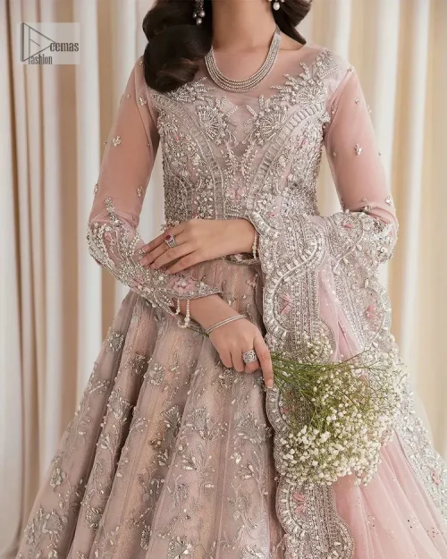 Rose Pink, is the colour of confidence on your big day. The blouse in the rose pink shade is embellished