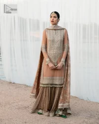 This ensemble is an absolute vibe with a tempting design on a beautiful base!  This beautiful party wear is designed in soft brown colour which is modern yet classy. The short shirt is adorned with silver embroidery which is further enhanced with tilla, dabka, kora, Kundan and the details of Zardozi. The beautiful tussles also hang on the bottom of the embellished neckline to make it a perfect choice for everyone Further, the floral patterns on full sleeves also intensify the charms of the outfit. It is coordinated with a sharara to balance the overall look. Complete this with a dupatta embellished with a four-sided border and floral jaal all over.