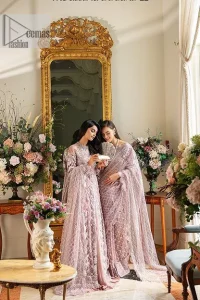 Incoming: that nikkah feeling with some flowers. Unique maxi for nikkah outfit in soft pink colour is embellished with silver pearls sequins, kora, dabka, tilla, Zardozi and Kundan work. Maxi Sleeves are fully embellished with embroidery and are in floral patterns. The Jewel neckline also makes this masterpiece unique and charming. Maxi Hemline is decorated with embroidery on the border. Further, the front open style makes it a perfect choice to pair with the dupatta. It is organized with a plain lehenga to balance the overall outfit. Complete this article with a dupatta framed with four-sided embellished scalloped borders and sequins sprayed all over.