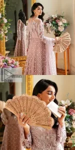 Incoming: that nikkah feeling with some flowers. Unique maxi for nikkah outfit in soft pink colour is embellished with silver pearls sequins, kora, dabka, tilla, Zardozi and Kundan work. Maxi Sleeves are fully embellished with embroidery and are in floral patterns. The Jewel neckline also makes this masterpiece unique and charming. Maxi Hemline is decorated with embroidery on the border. Further, the front open style makes it a perfect choice to pair with the dupatta. It is organized with a plain lehenga to balance the overall outfit. Complete this article with a dupatta framed with four-sided embellished scalloped borders and sequins sprayed all over.