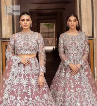 It’s regal, it’s rich, it’s festive. This magnificent nikah outfit is hand-embellished with luxury designs and beautiful silverwork which is highlighted with tilla, dabka, kora, Kundan and details of Zardozi. The boat shape neckline making this attire your foremost priority to wear on the most important day of your life. Further, the full sleeves of the blouse also decorated with beautiful embroidery It is coordinated with scalloped lehenga which is heavily embellished. Intricate designs and fine details of lehenga give a perfect finishing look to this masterpiece. Complete this outfit with dupatta in the same colour. The dupatta is in delicate heavy embellished border gives an exquisite look to the gorgeous bride. The scalloped borders of this dupatta give a stylish touch to this outfit.