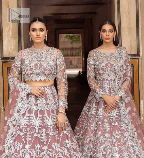 It’s regal, it’s rich, it’s festive. This magnificent nikah outfit is hand-embellished with luxury designs and beautiful silverwork which is