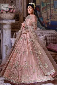 Wrap yourself in stunning style on your Big day. This tea-pink maxi dupatta is a stunning attire to wear at the wedding. This breathtaking nikah wear is gracefully adorned with hand-crafted embellishments and lavish golden work creating a magnificent masterpiece to give you your desired appearance. Intricate designs, floral details, naqshi, kora, Kundan, tilla and dabka o maxi enhance the overall charm of this beautiful outfit. The full sleeves of the maxi are highlighted with golden embroidery. Further, the boat shape neckline makes this outfit an epitome of beauty. It is systemized with a dupatta in the same colour adorned with four-sided borders and floral motifs all over.