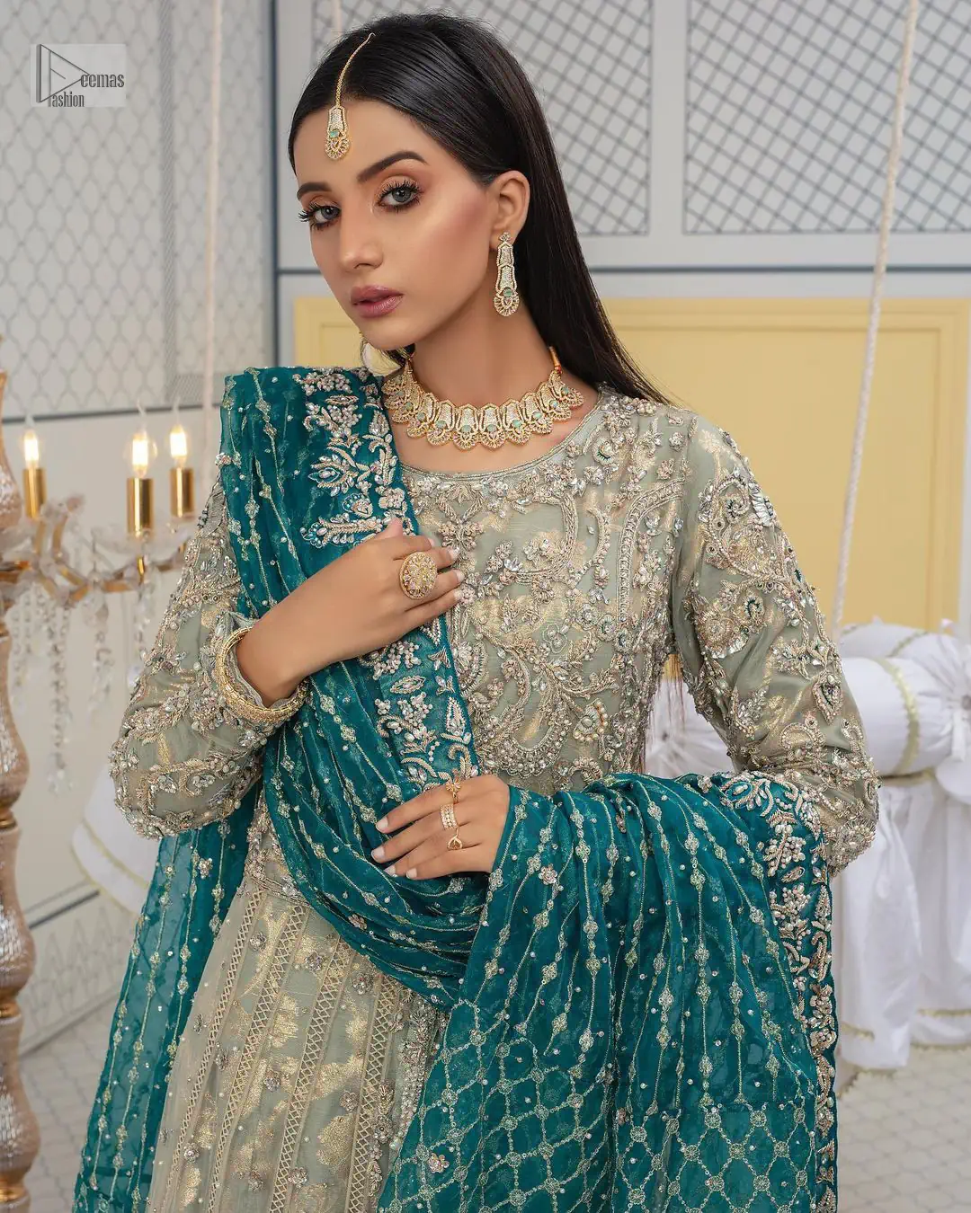 Embellishment is on the rise! The elegant front open maxi is heavily embellished in work of tilla, sequins, dabka, Zardozi,