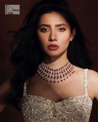 Chill vibes on your big day with this walima outfit. A soft pink blouse is embellished in tilla,dabka, kora, Kundan and crystals with a fish cut style lehenga with a huge trail at the back. The blouse has a sweetheart neckline to make this outfit romantic. Further, the blouse is embellished with silver embroidery just to make you a spotlight of the show. The sleeveless style makes this masterpiece unique and lovely. It is paired up with a fish-cut lehenga in the same colour. The heavy bak train lehenga is adorned with embroidery making a bride look more regal than a costume.