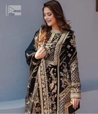 Intricate floral patterns all over! Make a style statement with this elegant embroidered long shirt adorned with golden embroidery decorated with sequins, tilla, dabka, kora, Kundan, heavily embellished bodice, and floral bunches. The round neckline of the following shirt makes this article stunning and charming. The full sleeves of the shirt are also magnified with floral motifs. It is paired up with trousers in the same colour to balance the overall look of this party wear. Complete this outfit with a dupatta framed with four-sided borders and tiny floral motifs all over which is exactly a pure trendy style.