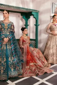 Mark your presence in this elegant Mehndi outfit. The front open scalloped pishwas in the teal green shade are adorned with hand-crafted details of tilla, dabka, Kora, Kundan and the real magic of Zardozi. It is further enhanced with golden embroidery to give a royal touch to this outstanding pishwas. The floral matters on full sleeves enhance the beauty of the outfit. In addition to this, the round neckline style of the following pishwas is absolutely breathtaking. It is paired with crushed lehenga n the same colour to enable the fairness of the outfit. Complete this stunning dress with a dupatta framed with a four-sided border to highlight your presence.