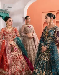 Mark your presence in this elegant Mehndi outfit. The front open scalloped pishwas in the teal green shade are adorned with hand-crafted details of tilla, dabka, Kora, Kundan and the real magic of Zardozi. It is further enhanced with golden embroidery to give a royal touch to this outstanding pishwas. The floral matters on full sleeves enhance the beauty of the outfit. In addition to this, the round neckline style of the following pishwas is absolutely breathtaking. It is paired with crushed lehenga n the same colour to enable the fairness of the outfit. Complete this stunning dress with a dupatta framed with a four-sided border to highlight your presence.